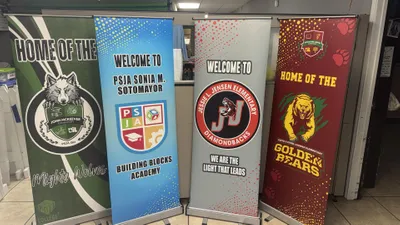 Roll Up Banner Stands - A gift we give out to Schools as a appreciation by with been with us